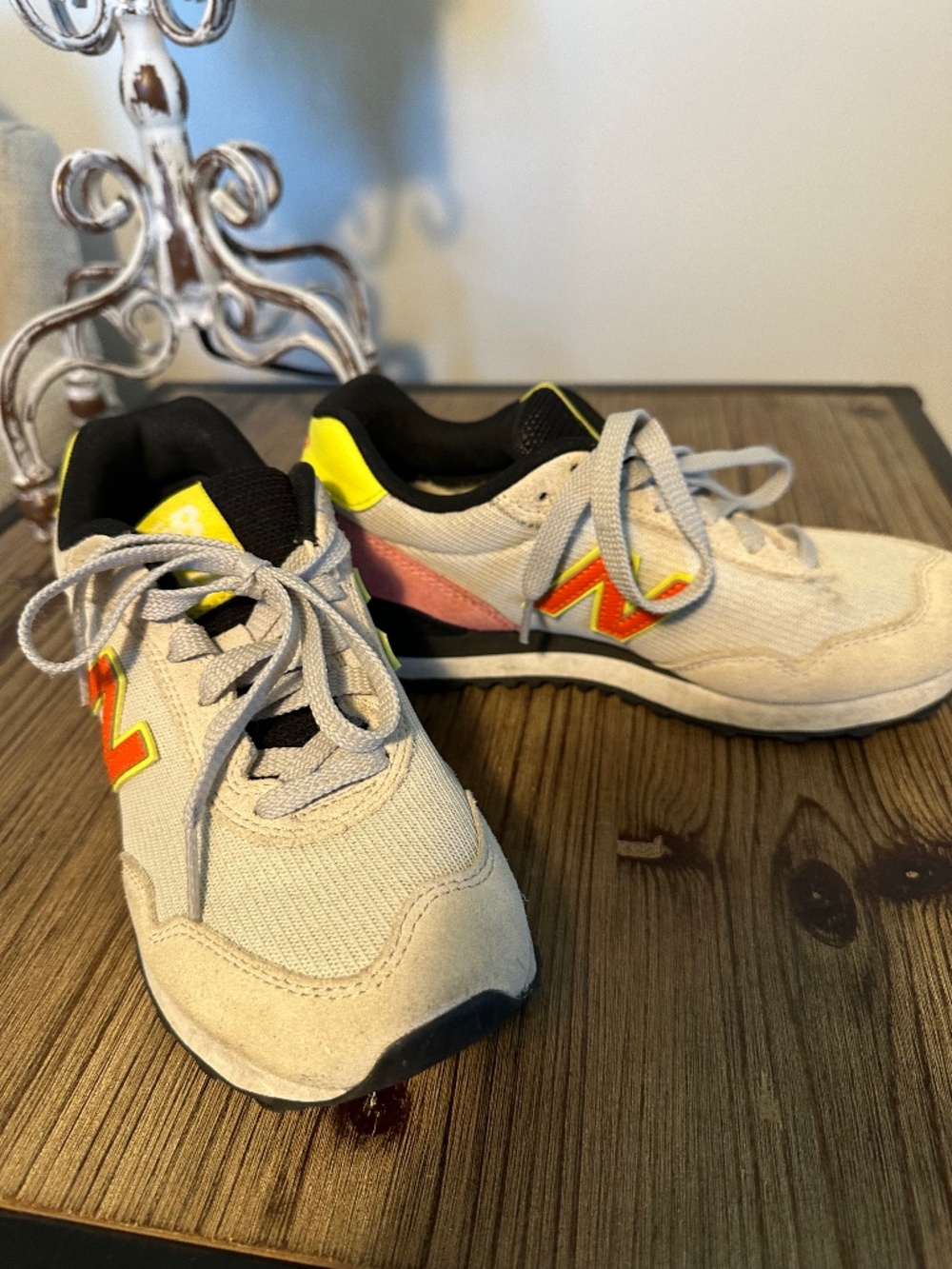 New Balance tennis shoes, gray with yellow and black trim, pink suede, size 7.5